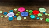 Buttons on wooden table